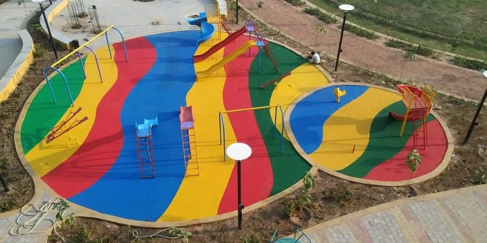 Outdoor play area with colourful surfacing