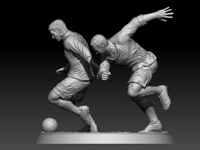 Concept sculpture of two football players in motion