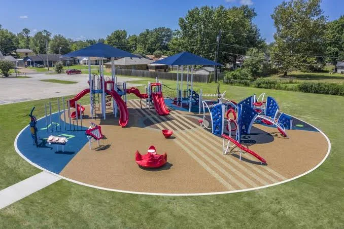 Outdoor playground with slides and play equipment
